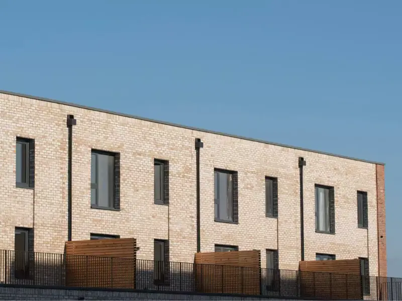 External row of Burney townhouses in the sunshine