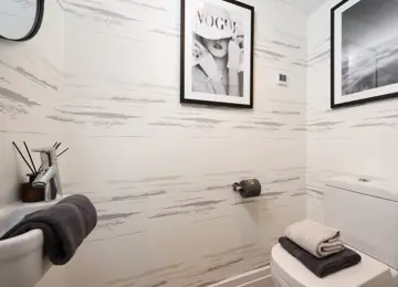 Stylish monochrome downstairs WC toilet.