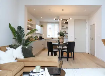 Open-plan kitchen diner, with the added benefits of a seating area and living space.