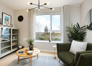 Stylish kitchen snug flooded with natural light and comfortable seating.