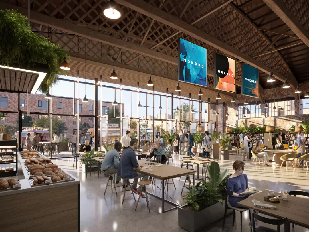 Café and Community Spaces at The Hangar. Vibrant café at The Hangar ideal for coffee with friends or family lunches. Versatile multi-use spaces fostering community connection.