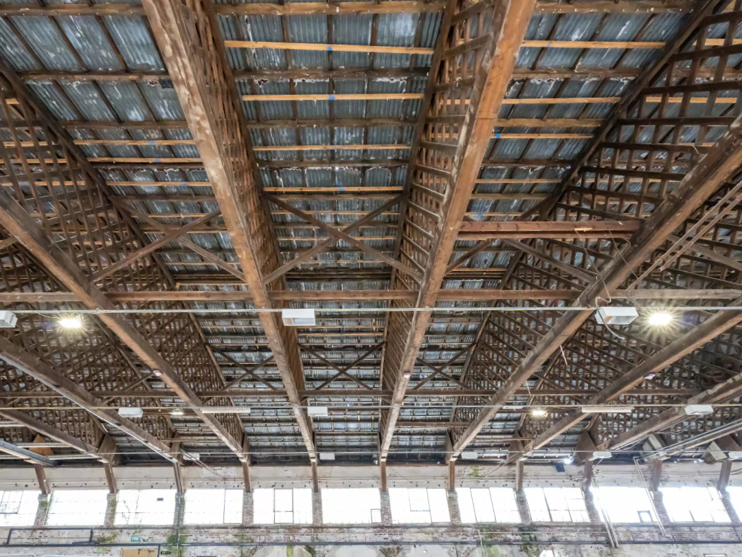 Close up of the aged roof trusses in the historic aircraft Hangar 16U.