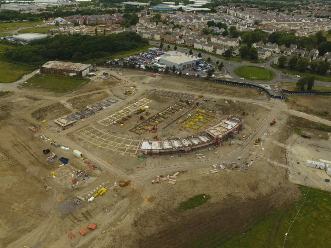 Aerial drone photograph showing the outline foundations of the new homes being built at Brabazon from the East