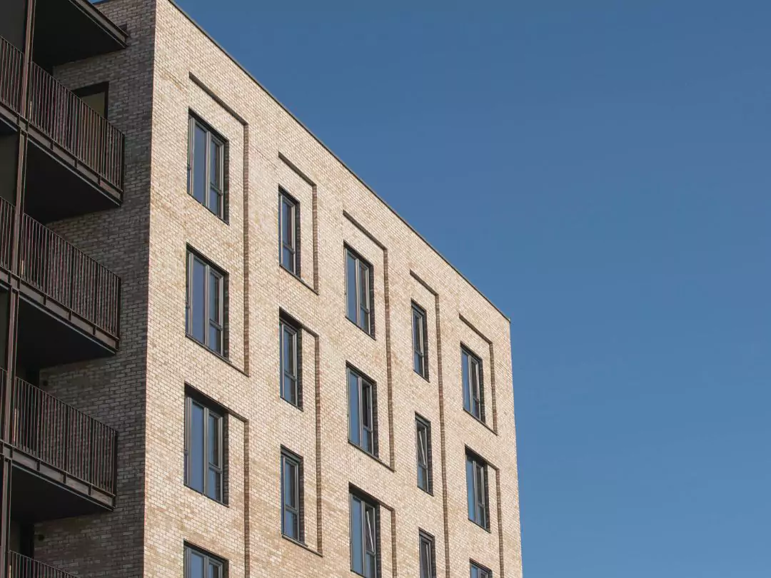 External shot of top three floors of The Dials apartments at Brabazon on a sunny day. 